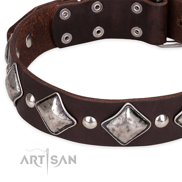 Adjustable leather dog collar with resistant to tear and wear non-rusting buckle